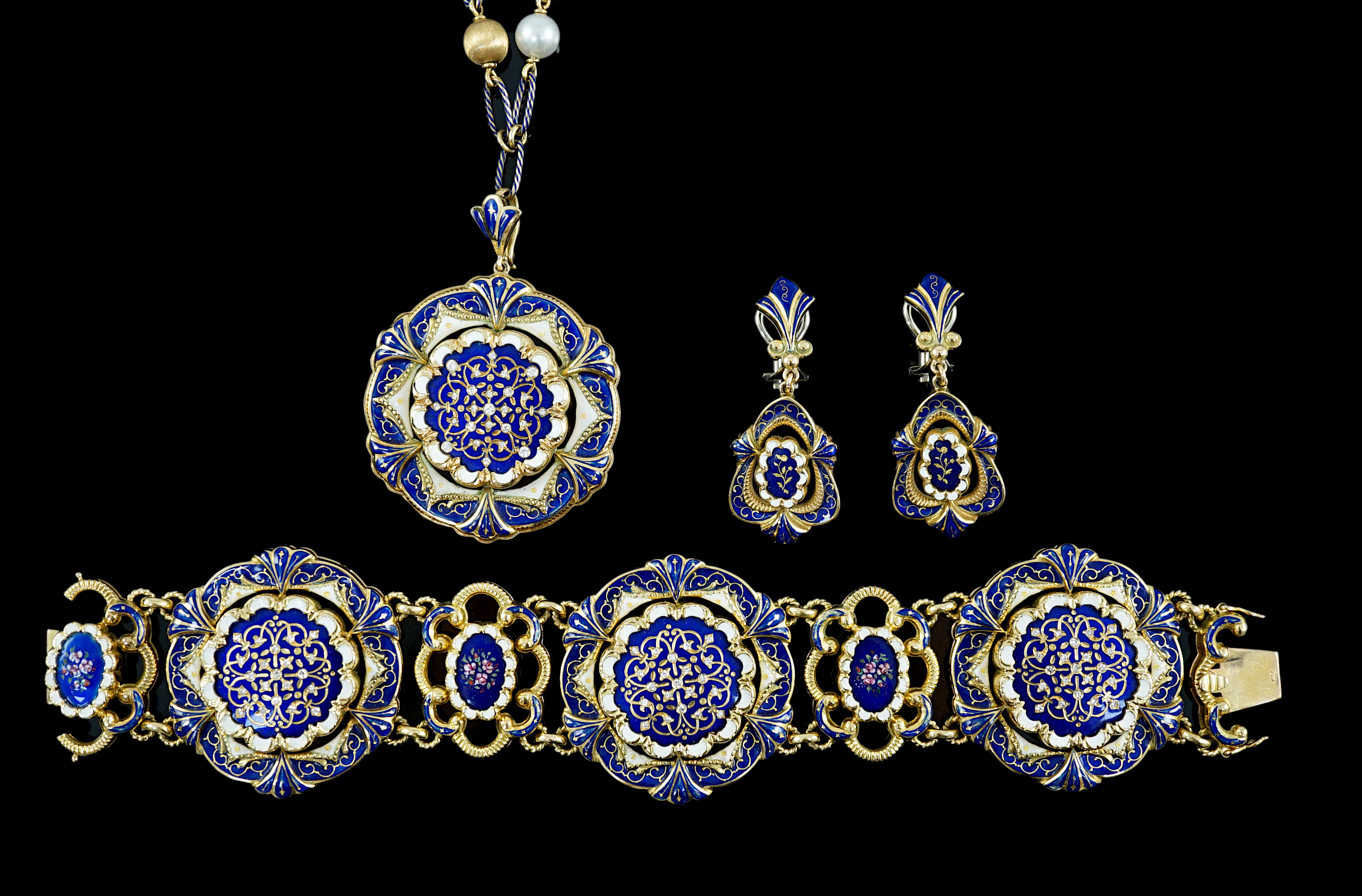 A late 19th century Swiss 18ct gold and polychrome enamelled suite of jewellery, retailed by E. Meister, Zurich